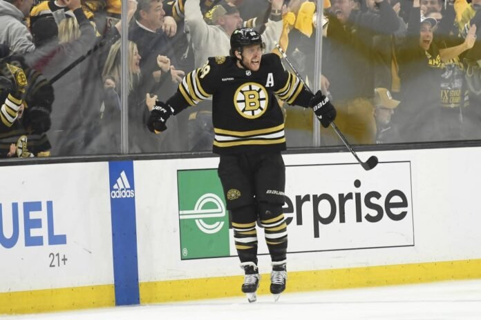 Bruins end Leafs season with OT win in Game 7

