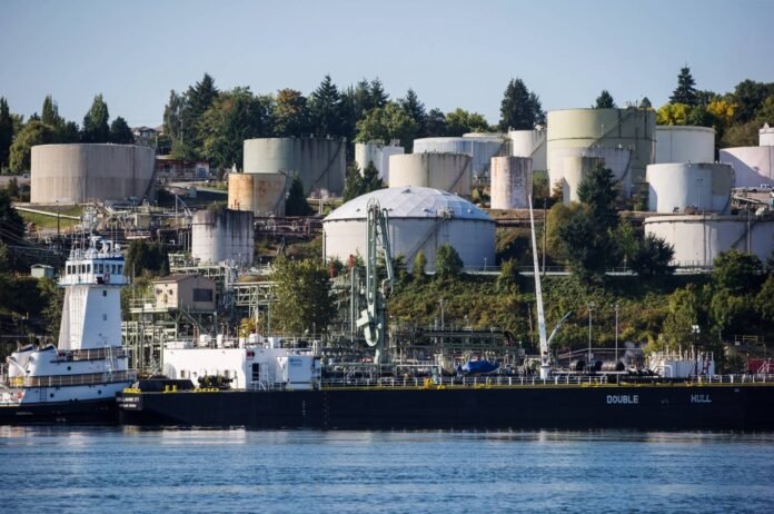 A double-hulled tanker sits docked in front of the Burnaby Refinery, near Vancouver, Canada. Natural gas is a key component of the city’s energy use.  
