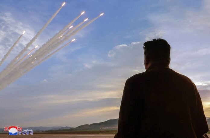North Korea says a salvo of 18 missiles alerted the South

