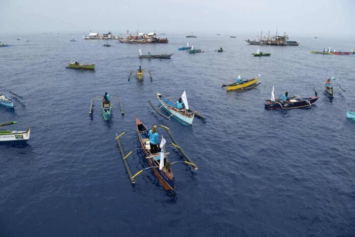 Philippine boat convoy will not proceed to Chinese-occupied reef, organizers say

