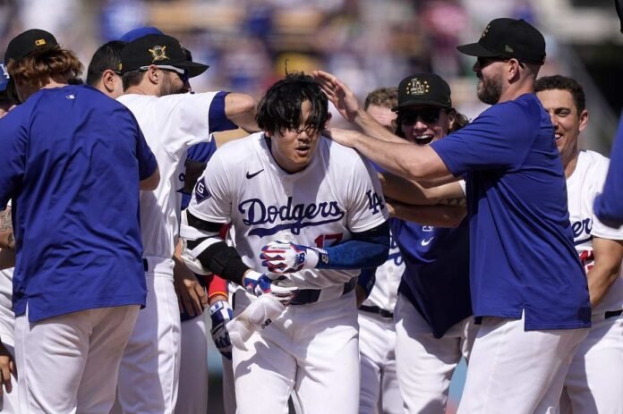 Shohei Ohtani delivers a Walk-Off Single in the 10th inning of the Dodgers' 3-2 win over Cincinnati

