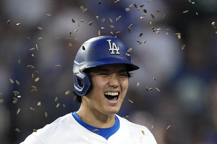 Shohei Ohtani hits 2-run homer and scores go-ahead run on his special day in LA as Dodgers beat Reds 7-3

