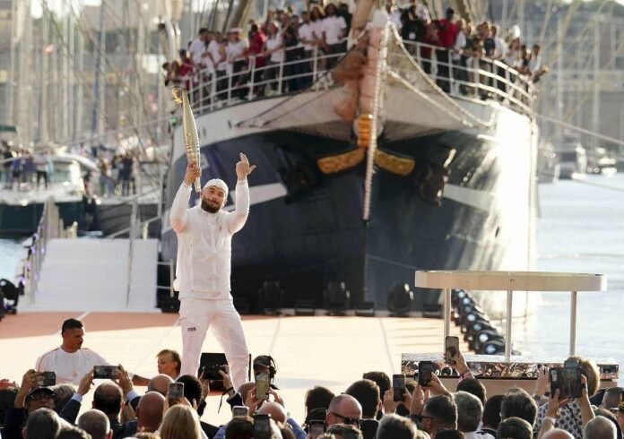 The Paris Olympic Flame arrives in France by ship from Greece

