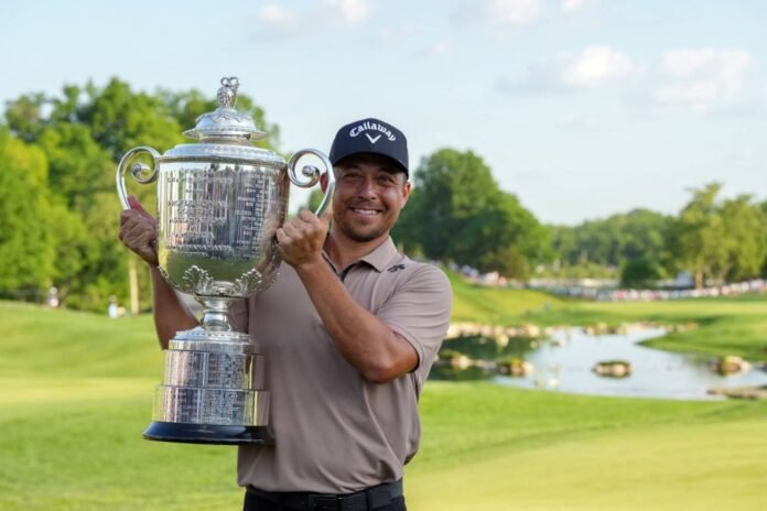 Xander Schauffele poses with the Wanamaker Trophy after winning the PGA Championship in Louisville, Kentucky, on Sunday. 