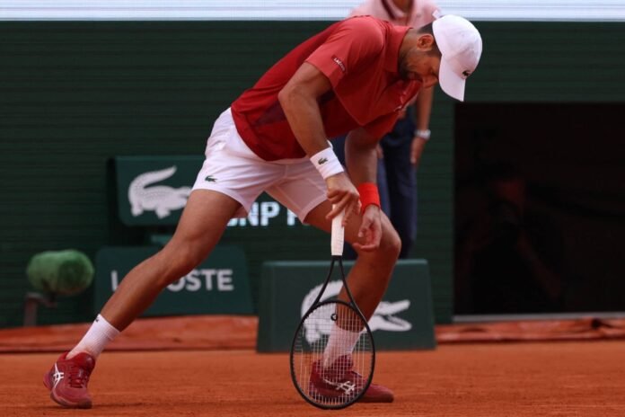 Djokovic unsure about French Open quarter-finals after knee injury

