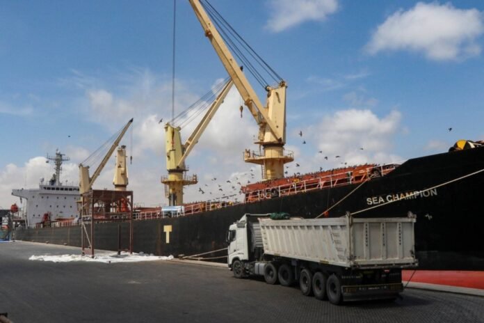 Greek-flagged bulk cargo vessel Sea Champion is docked to the port of Aden, Yemen to which it arrived after being attacked in the Red Sea in what appears to have been a mistaken missile strike by Houthi militia, in February. 