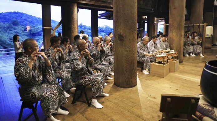  Instrumentalists pray for safety during the upcoming Gion Matsuri Festival;  Group set to perform floating during event

