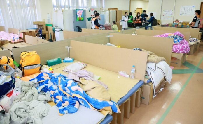 Japan demands beds be available in evacuation centres from the start

