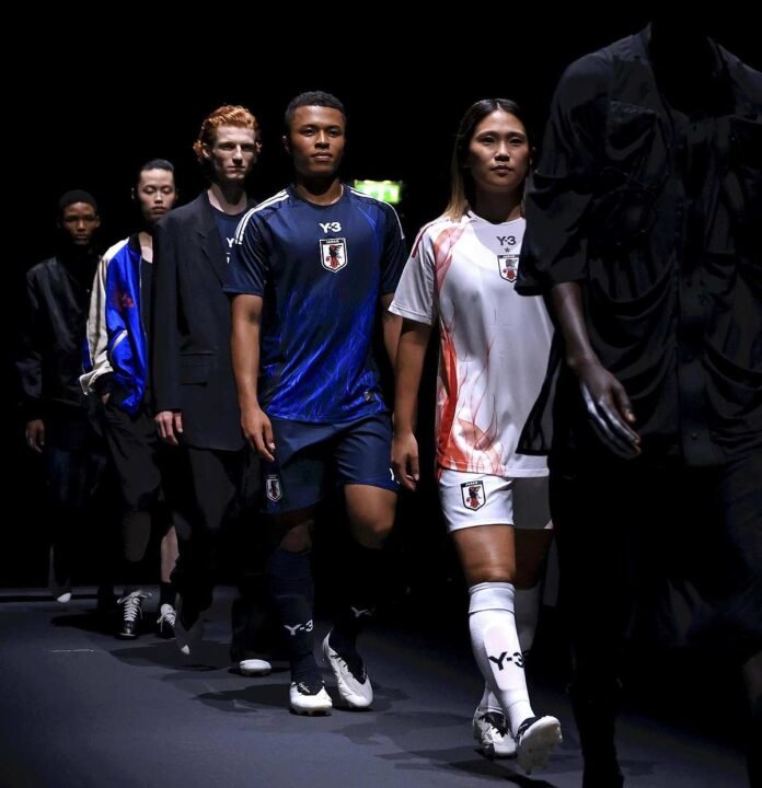  Japanese National Football Teams Unveil New Uniforms;  Players walk the track during Paris Fashion Week ahead of the Olympic Games

