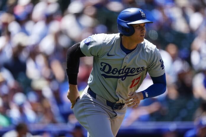 Ohtani hits 21st homer, Smith and Freeman also go deep in Dodgers' 5-3 win over Rockies

