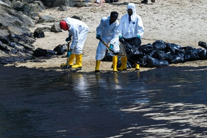 Singapore is working to clean up oil spills after a tanker accident

