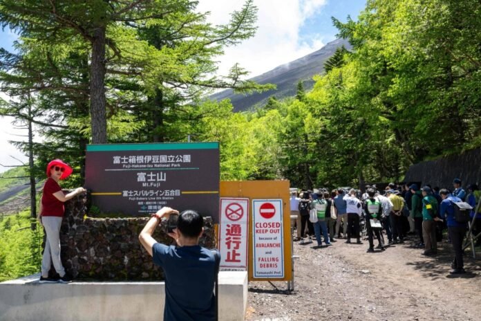 The gate of Fuji-Hakone-Izu national park near the Fuji Subaru Line 5th station, which leads to the popular Yoshida trail for hikers, at Narusawa, Yamanashi Prefecture, on June 19 