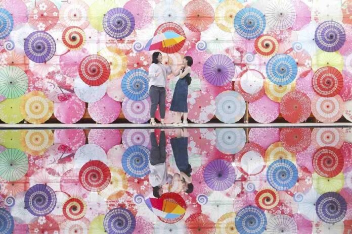 Umbrella Sky event dazzles visitors with 740 colorful umbrellas at Inawashiro Herb Garden in Fukushima Prefecture.

