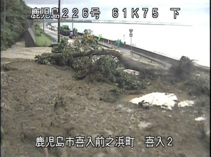 National Route 226 in the city of Kagoshima is seen covered in debris from a landslide on Friday morning. 