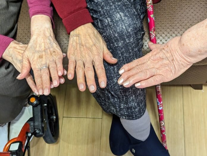 'Well-being manicures' bring a touch of color into the lives of Japan's elderly

