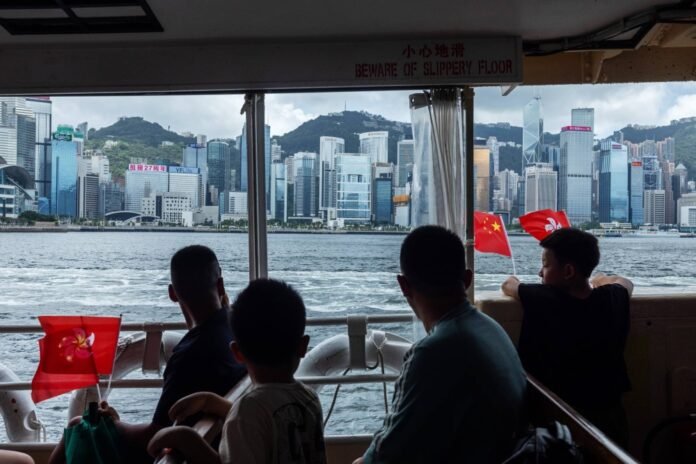 As Singapore tightens controls, wealthy Chinese return to Hong Kong

