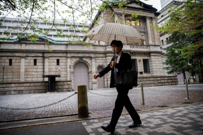 BOJ urged to halve bond purchases in planned tightening plan, minutes show

