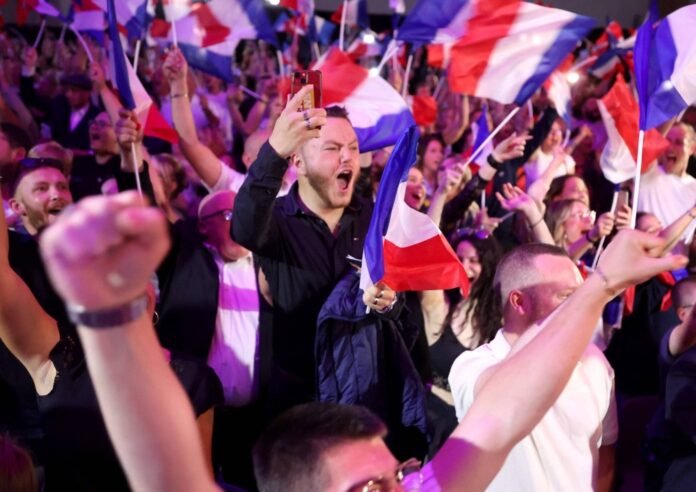 Far right wins first round of French elections, exit polls show

