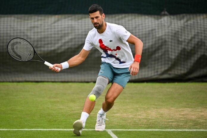 Novak Djokovic practices at The All England Club in London on Wednesday. 