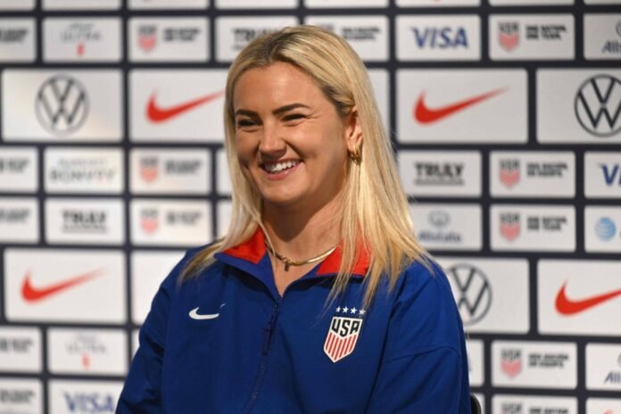 U.S. soccer player Lindsey Horan speaks during a U.S. Olympic women's and men's team news conference in New York on Monday. 