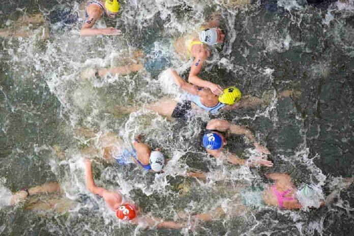 Belgium withdraws from mixed relay triathlon after athlete who swam in Seine falls ill

