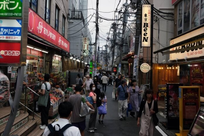 Japan warns of impact of weak yen on households in government white paper

