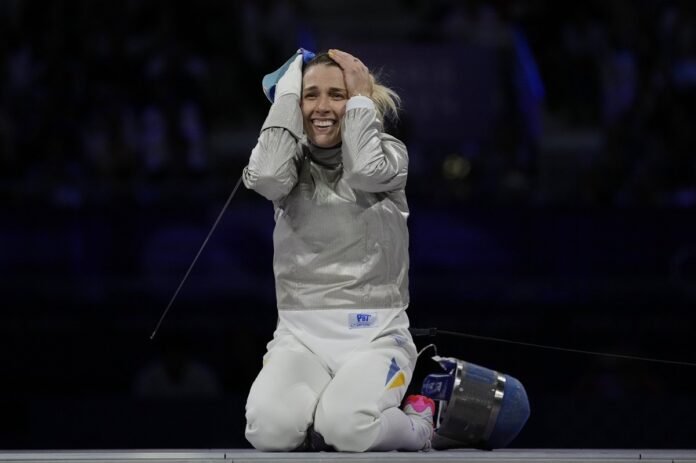 Ukraine wins its first gold medal at the Paris Olympics, in women's team sabre fencing

