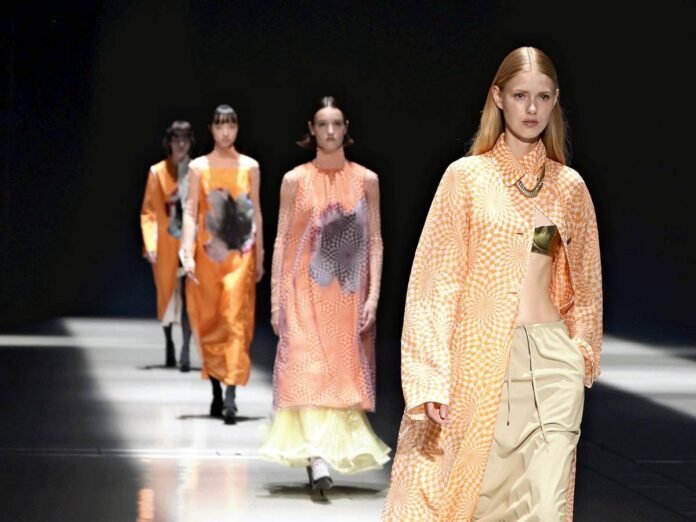 Eco-friendly clothing showcased at Tokyo Fashion Week; brand shows clothes dyed with low-water technology

