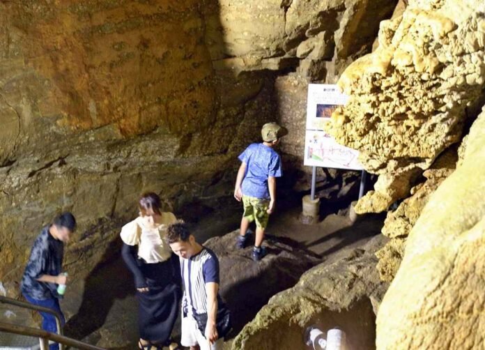 Nagasaki: Visitors flock to limestone caves to beat the relentless heat; Caves remain at a cool 15 C all year round

