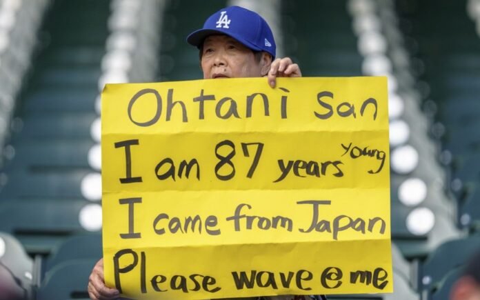 Shohei Ohtani evens the score at 2-2 in the seventh inning with a two-out RBI double; Dodgers beat Braves 9-2

