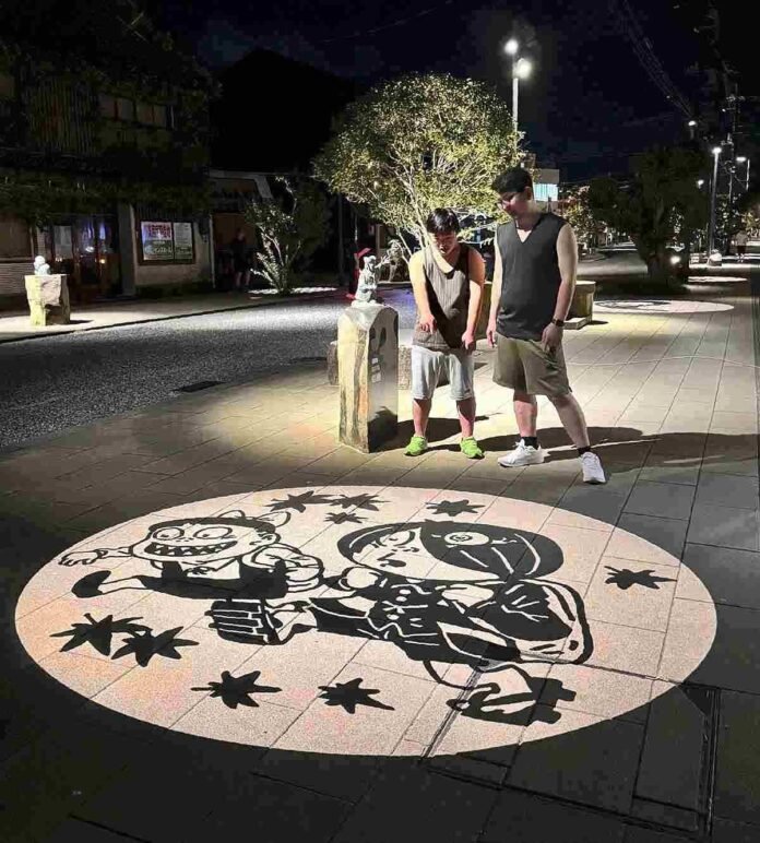 When the sun sets, “GeGeGe no Kitaro” comes out; Yokai images light up sidewalks in a Japanese city

